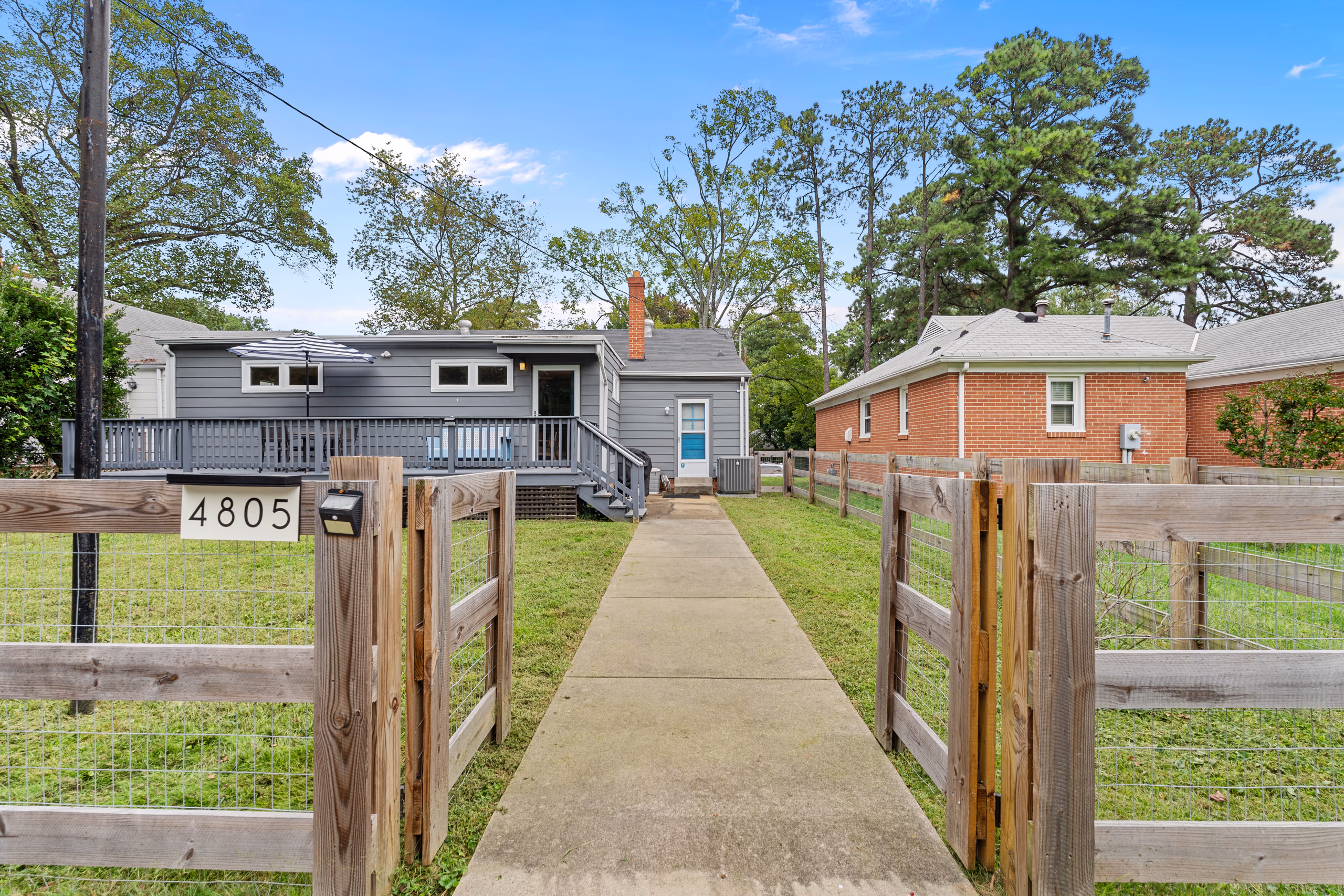 Gray house with deck and address 4805, for sellers.